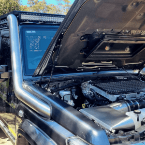 Toyota LandCruiser 79 Series engine bay with Torqit Stainless Steel Airbox and snorkel installed