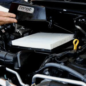 Ryco flat paper filter being fitted into Torqit Jimny airbox