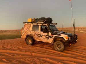 Torqit camo-wrapped 76 Series LandCruiser Troopy in desert dunes