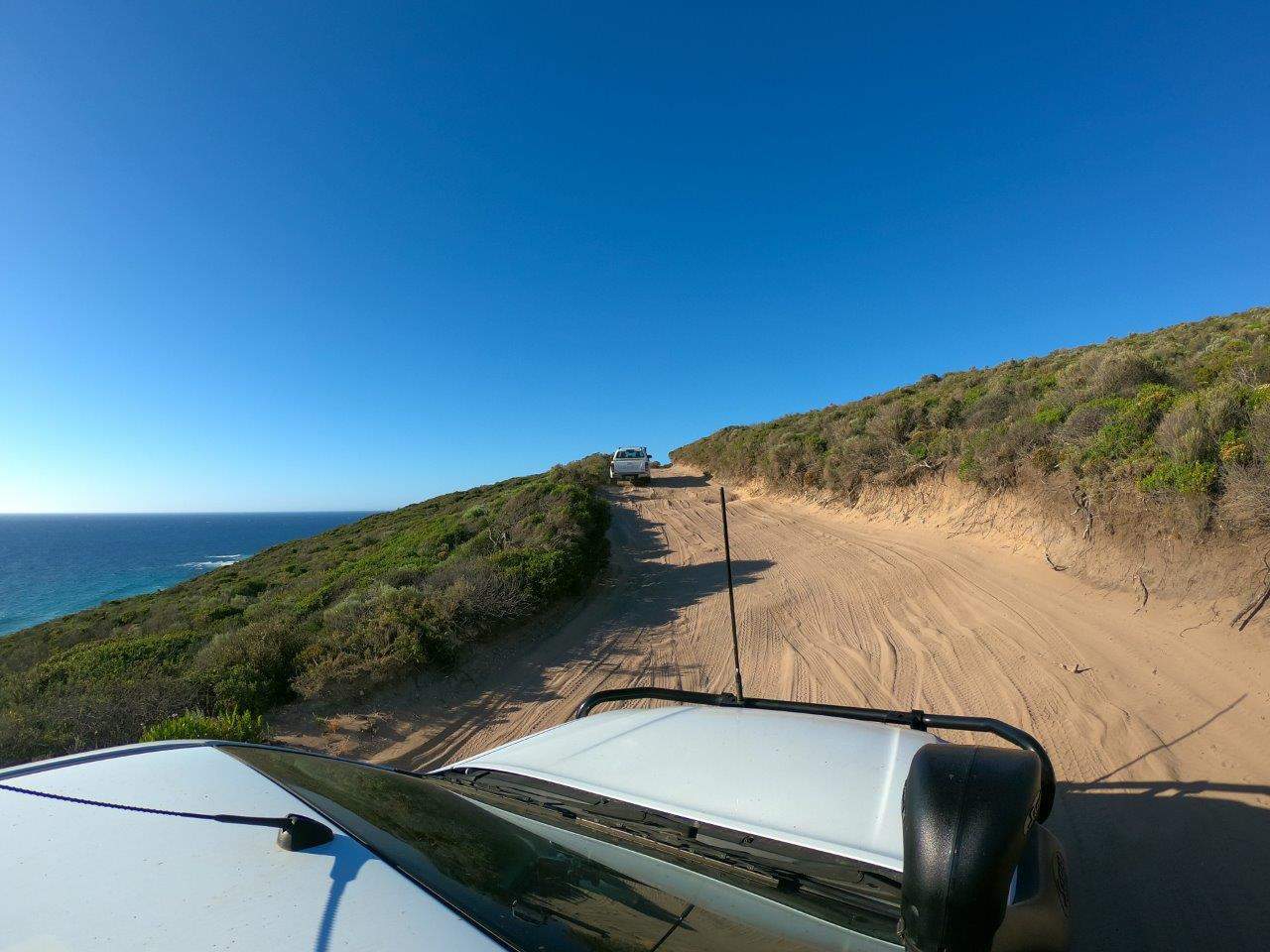 4WD driving on sandy Three Bears Track near Dunsborough with ocean views