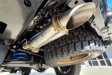4WD stainless steel exhaust system installed under vehicle