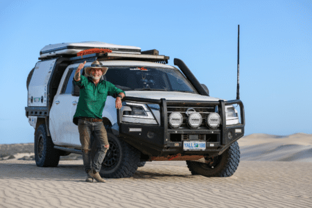 Graham Cahill standing next to a 4WD vehicle at a remote off-road location north of Perth