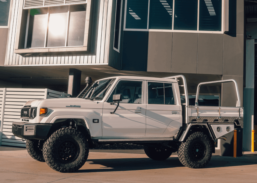 White LandCruiser parked outside Torqit Performance Centre in the Hunter region.